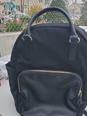 Lo & Sons Black Backpack with Gold Zipper Accents